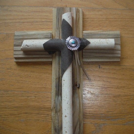 Rustic recycled barn wood and stone cross wrapped in lea r